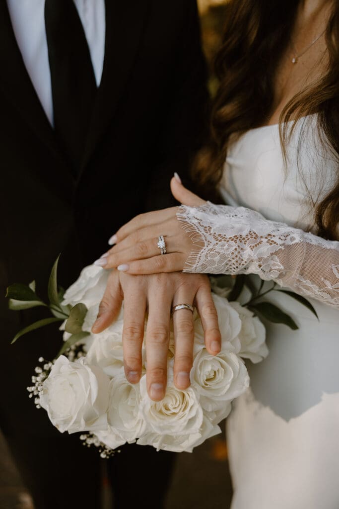 close up ring details of bride and groom in asheville nc