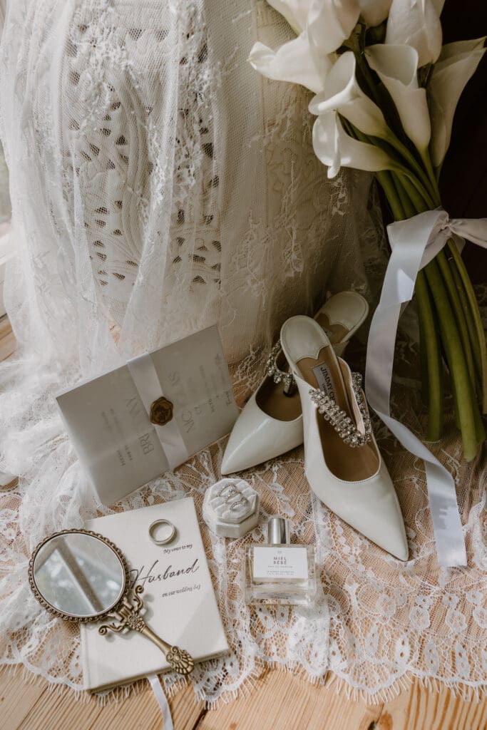 personalized wedding details with jimmy choo shoes and a calia lily bouquet