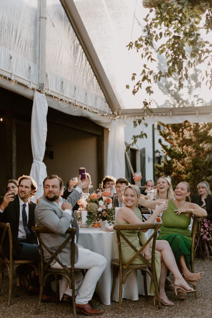 Guests celebrating at an autumn wedding ceremony at Hotel Domestique in Travelers Rest SC